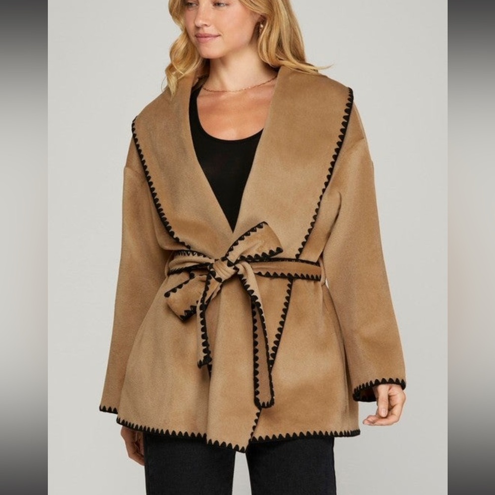 She + sky coat